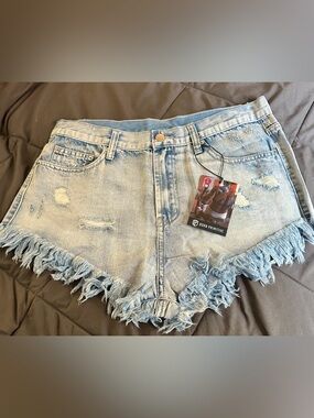 Born Primitive Washed Light Blue Distressed Denim Cutoff Shorts